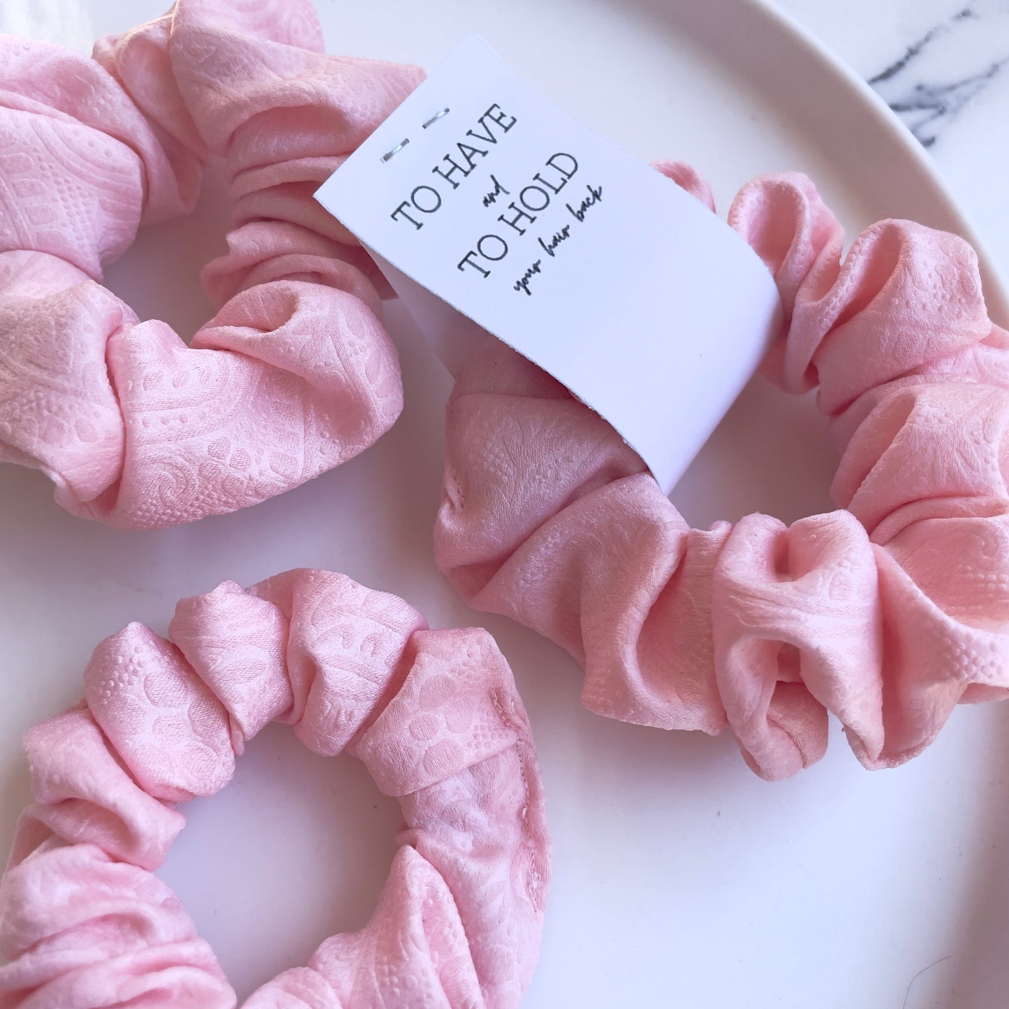 Baby pink fabric scrunchie