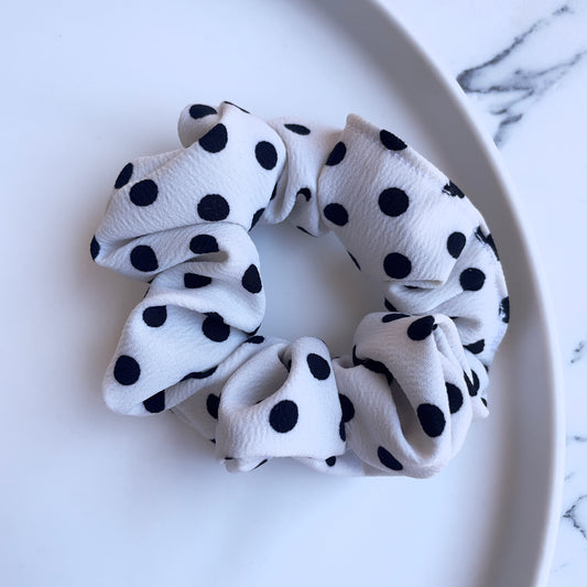 White polka dot scrunchie